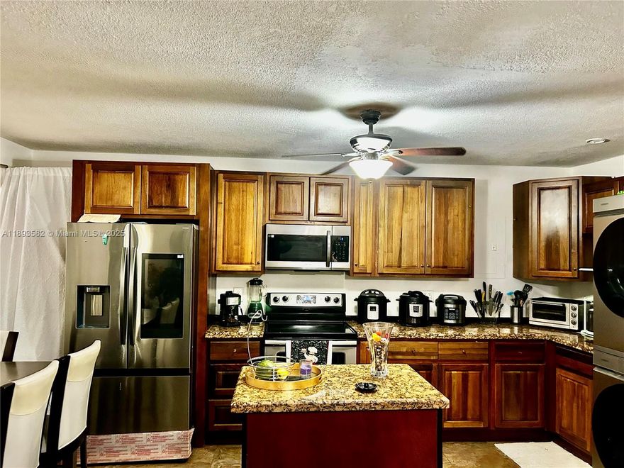 Cozy 2 bedroom 1 bath, with open space kitchen, tile floors, stainless steel appliances! New washer & dryer inside the apartment. GREAT OPPORTUNITY FOR INVESTORS-CAN BE RENT IMMEDIATELLY- AND/OR PERMANENT RESIDENCE!! AMAZING LOCATION BETWEEN HOLLYWOOD BLVD AND PEMBROKE RD-CLOSE TO DOWNTOWN HOLLYWOOD. NICE POOL WITH BARBECUE AREA & LARGE BACKYARD. LAUNDRY FACILITY,COMMUNITY ROOM.
