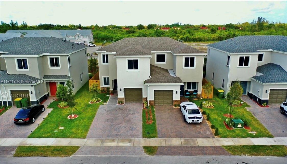 Discover this stunning 3 bedroom, 2.5 bathroom home, built in 2020 , fully remodeled featuring a modern kitchen with stainless steel appliances and granite countertops. Enjoy outdoor living an above ground pool and deck for BBQ. Beautiful concept of the layout with a large master bedroom and large walk-in closet, spacious 1- car garage and pavered driveway with plenty of parking. Additional highlights, the property includes solar panels on roof. The community has a low HOA . Just minutes from the Turnpike and 30 minutes from the Florida Keys. close to all mayor highways and entertainment centers such as restaurants and malls.
