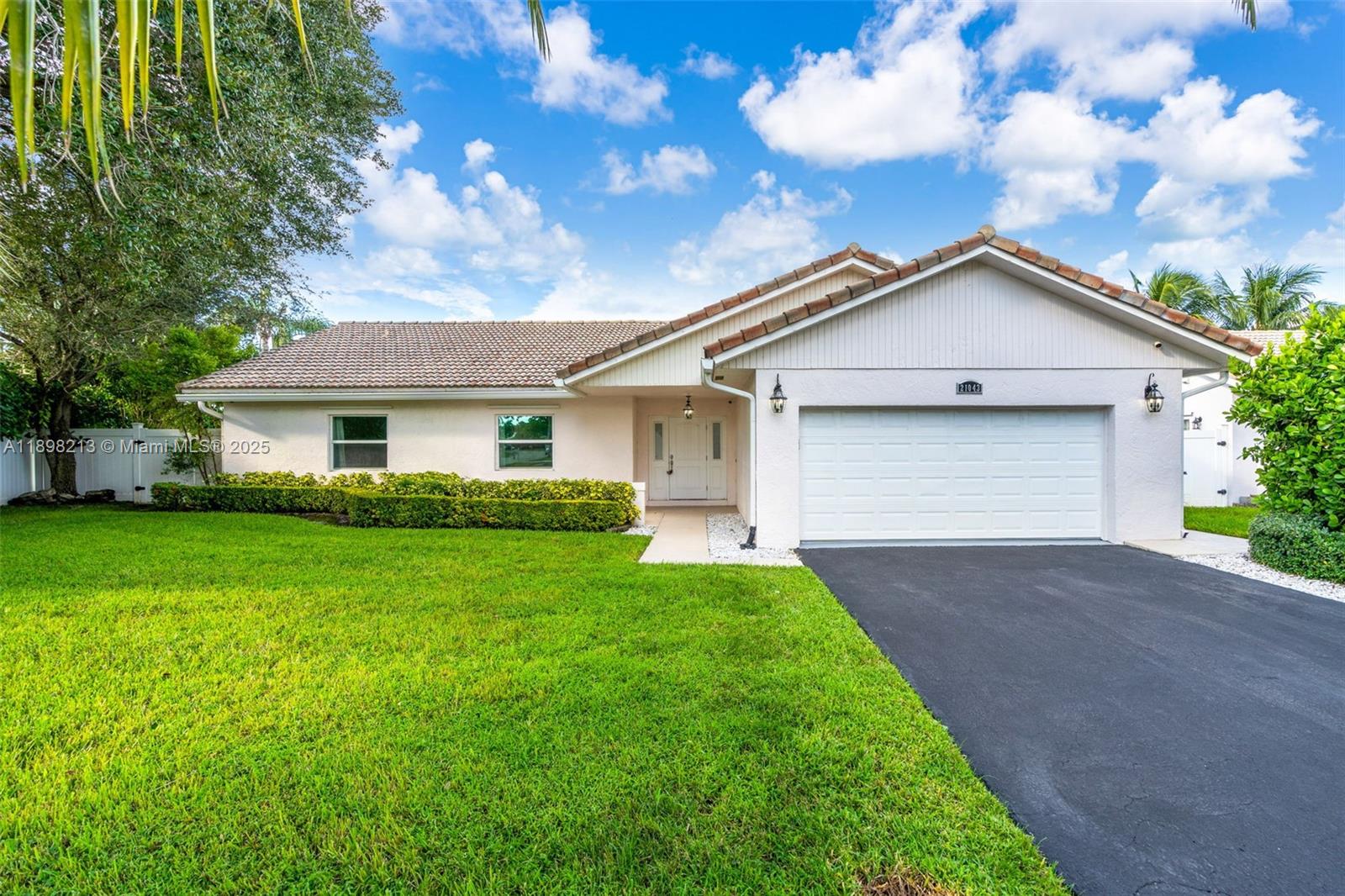 Elegant 3-bedroom, 2.5-bath home with an office/den in the guard-gated Escondido community of Boca Raton, offering modern comfort and security. Features include a bright open floor plan, contemporary kitchen with stainless steel appliances and an unused range, updated bathrooms with premium fixtures, and a luxurious master suite with pool access. Enjoy a private heated pool, canal-front backyard ideal for fishing, and high-impact windows and doors for safety and efficiency. A built-in 4K wired security system provides 24/7 peace of mind, while lawn care, pool maintenance, and pest control are included. Located in a peaceful, family-friendly community within the top-rated Palm Beach School District and close to parks, shopping, and dining.