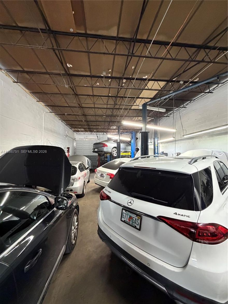 First time offering a well-established automotive repair business located near 826 expressway & turnpike entrance doing business since 1986. Great opportunity for an entrepreneur or experienced mechanic looking to own their own business. Sale includes 4 lifts, tire balancing machine, air compressor, and leasehold improvements. Office with central air. Two bathrooms. Approximately 2,500 sq ft, We are a licensed dealership