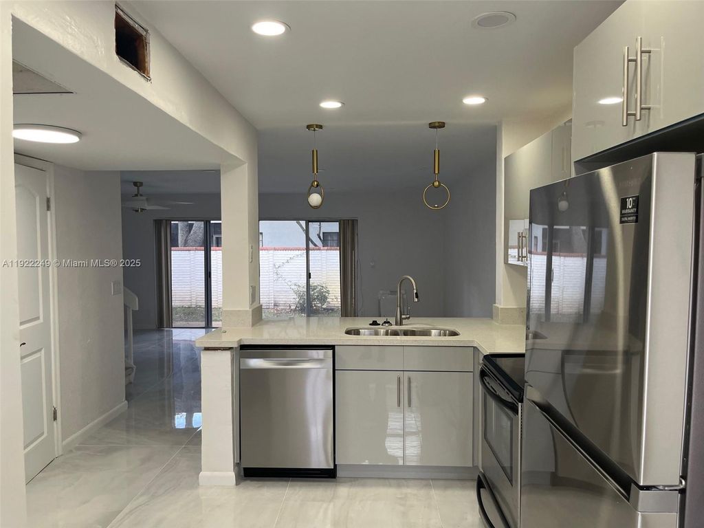 Photo of 8939 NW 23rd St #8939, Coral Springs, FL 33065 (MLS # A11922249)