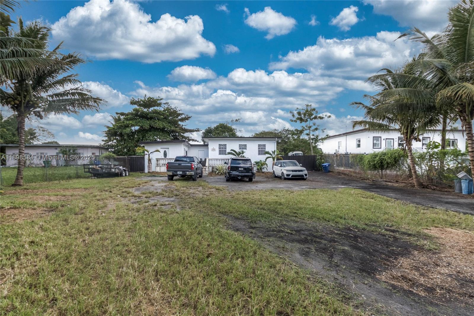 Welcome to this beautiful and recently updated 5-bedroom, 2.5-bathroom home nestled in the Little River Farms community. Sitting on 16,170 sq ft lot, this property offers the perfect blend of comfort, space, and waterfront living.
Enjoy peace of mind with a new roof, new A/C, and impact windows for added safety and energy efficiency. Inside, you’ll find a bright, open layout ideal for both family living and entertaining.
Step outside to your own backyard oasis, featuring a covered sitting area, a fully equipped outdoor kitchen, and ocean-access canal frontage — perfect for a jet ski or flat boat. Surrounded by fruit trees and tropical landscaping, this outdoor space is ideal for relaxing or hosting unforgettable gatherings by the water.