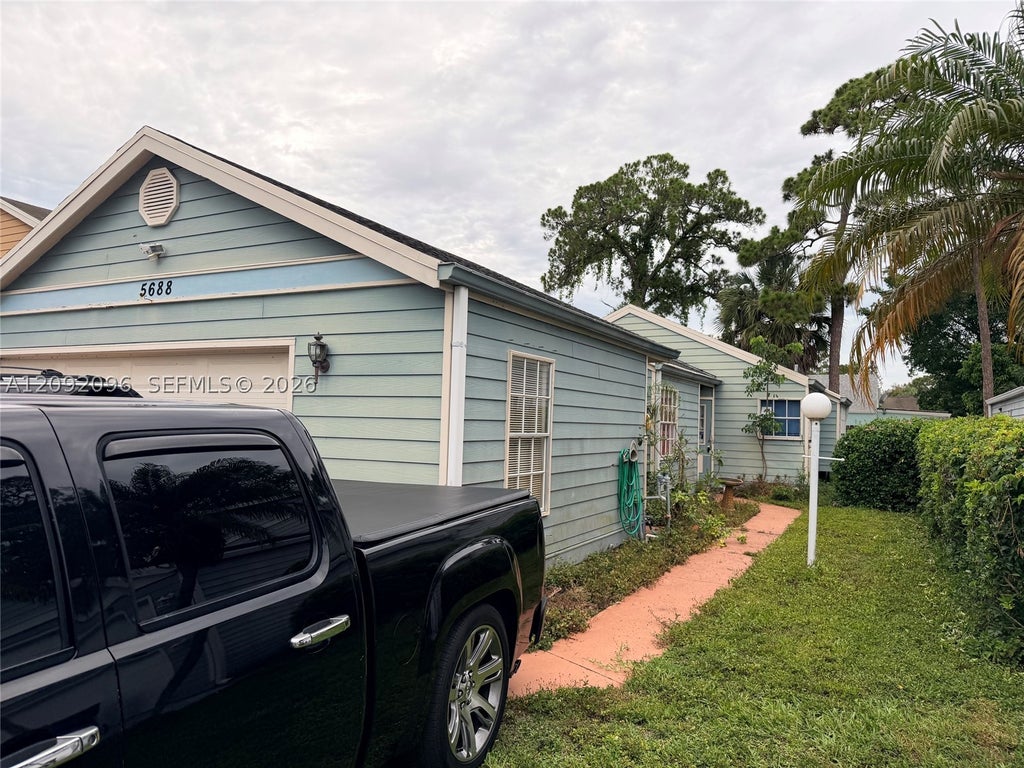 Photo of 5688 Dewberry Way, West Palm Beach, FL 33415 (MLS # A12092096)