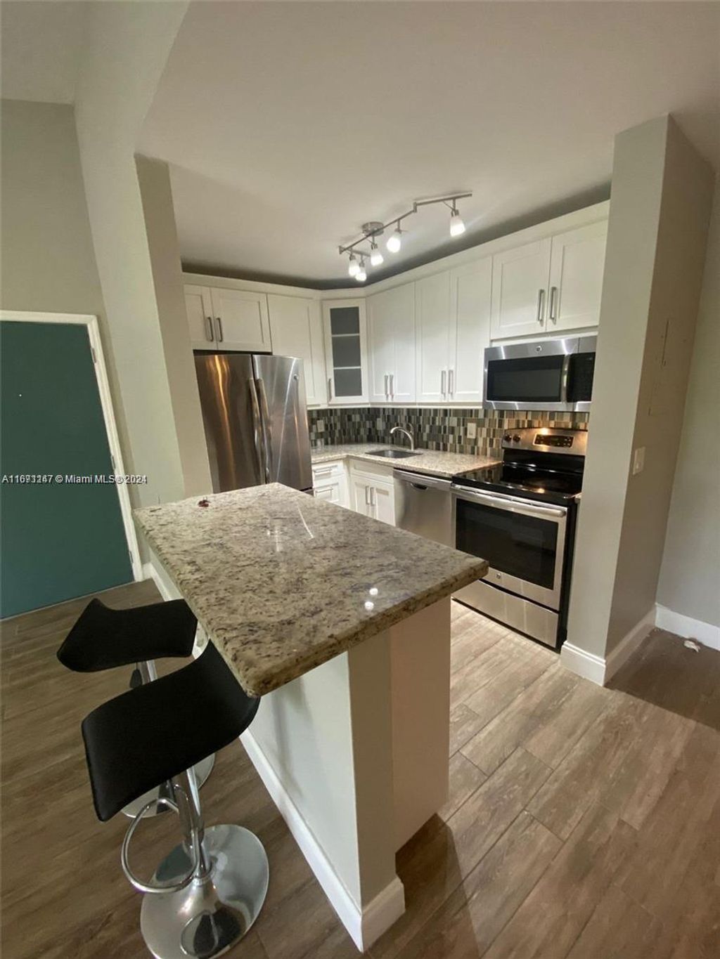 Photo of 10725 Cleary Blvd #304, Plantation, FL 33324 (MLS # A11671147)