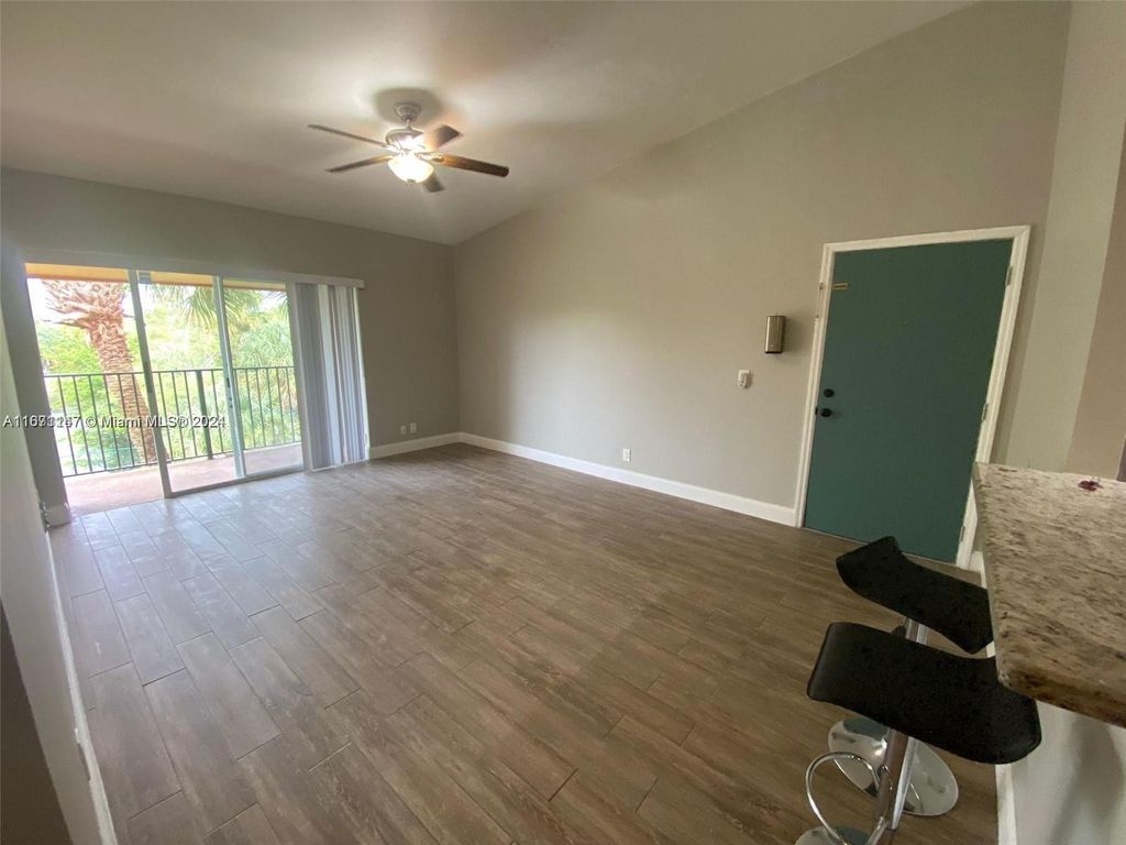 Photo of 10725 Cleary Blvd #304, Plantation, FL 33324 (MLS # A11671147)