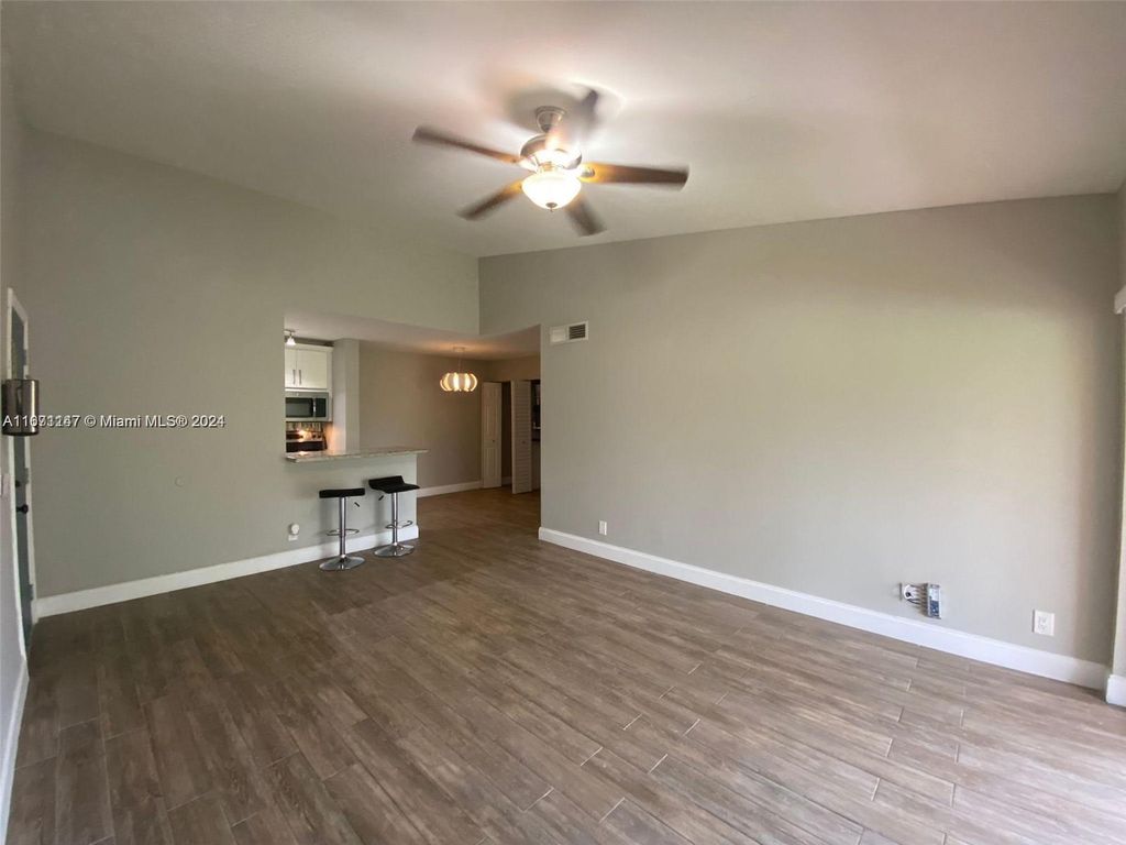Photo of 10725 Cleary Blvd #304, Plantation, FL 33324 (MLS # A11671147)