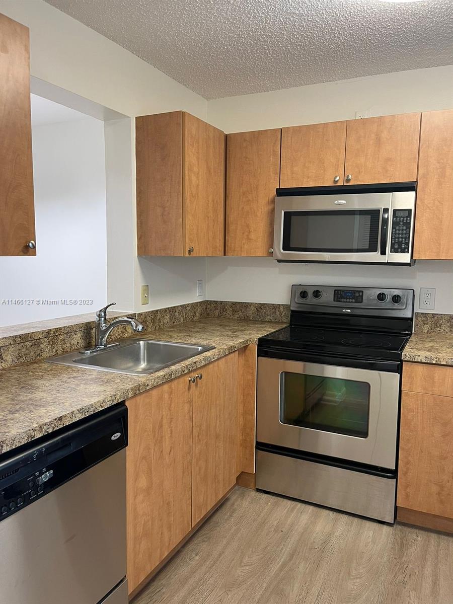Welcome to this renovated 2 bed/2 bath condo within a gated community just 5 minutes away from the iconic Hard Rock Stadium. New stainless steel appliances and updated countertop in Kitchen. Washer and dryer inside the unit. Spacious living room and bedrooms with central AC and fun in each bedroom.
Please use showing assist to coordinate appointments.