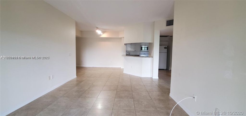 Photo of 3018 Alcazar Pl #303, Palm Beach Gardens, FL 33410 (MLS # A11853493)