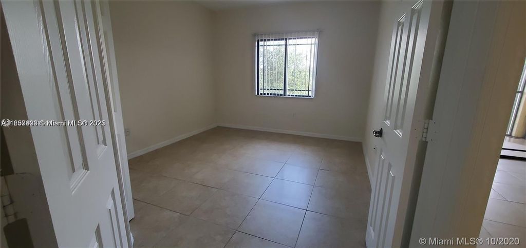 Photo of 3018 Alcazar Pl #303, Palm Beach Gardens, FL 33410 (MLS # A11853493)