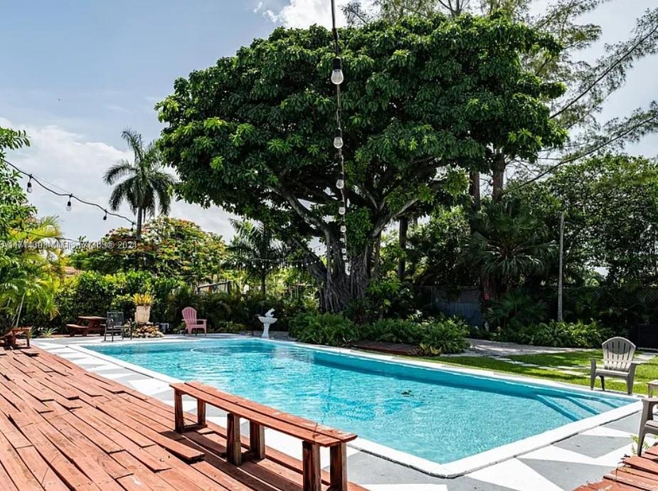 Magnificent house in an up and coming area. This house has it all, 8 foot deep pool, deck, dock, laundry, large shaded yard, solarium, shed, family room, two private patios, spa, ample bedrooms, fruit trees, dock and water access. Look no further, this is it. Solid house, low taxes great area close to everything yet very laid back and tranquil.