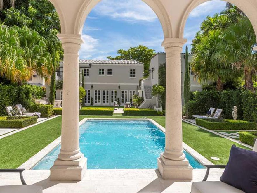 Palm Beach meets Miami at this elegant Pinetree pool home.  200' deep double lot with palatial park-like grounds featuring a Mediterranean pool folly with fireplace, outdoor kitchen, heated pool, front and back driveways and gates.  Main house restored an d rebuilt with the highest quality materials and flawless attention to detail and craftsmanship, including marble floors, gourmet kitchen. Detached 2-car air-conditioned garage and guesthouse. Smart Home technology throughout.