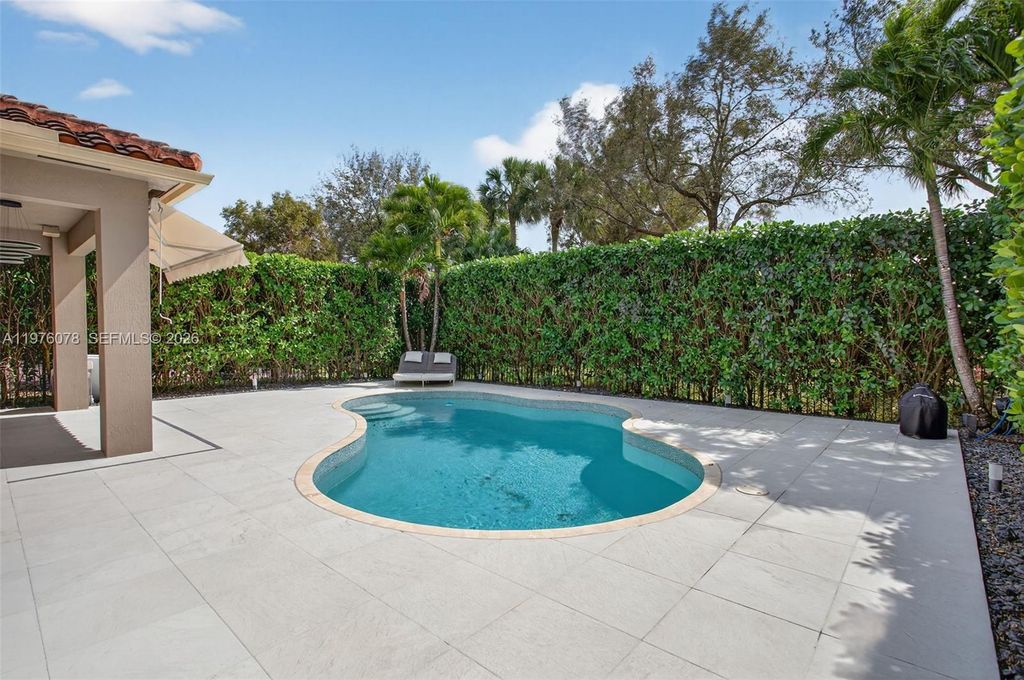 Photo of 11174 NW 72nd Pl, Parkland, FL 33076 (MLS # A11976078)