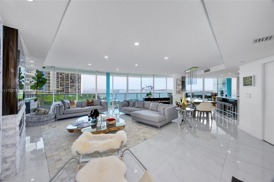 Experience unparalleled waterfront living at Bristol Tower. This impeccably renovated high-rise condo offers 2,600 sqft of refined space, featuring 3 spacious bedrooms & 3 modern bathrooms. Floor-to-ceiling windows frame breathtaking views of Biscayne Bay & the Key Biscayne Bridge, filling the home with natural light & unobstructed views.The open-concept kitchen is outfitted with top-tier Miele appliances, while sleek 30x30 porcelain flooring flows seamlessly throughout.The primary suite is a private retreat with 2 walk-in closets, dual vanities, a large shower & a freestanding tub perfectly positioned to capture stunning water views. Additional features: 2 deeded parking spaces, a storage unit, 24-hour concierge, a gym, spa, tennis court, BBQ area, valet service & a serene garden terrace.