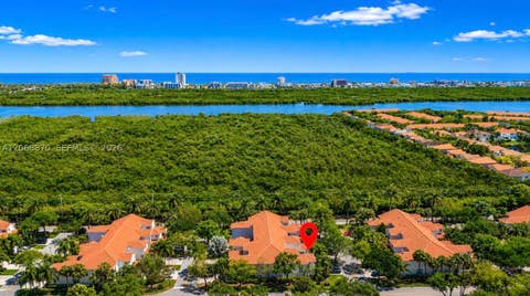 Photo of 1135 Cherrypalm Ln, Hollywood, FL 33019 (MLS # A12068870)