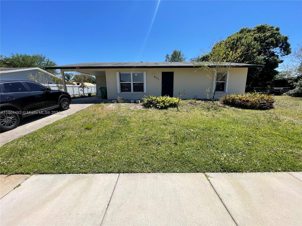 Photo of 673 SW Branford Dr, Port Saint Lucie, FL 34983 (MLS # A11564492)