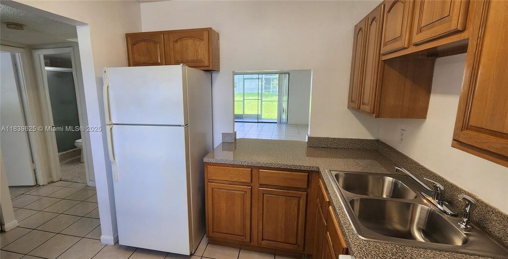 Photo of 7321 NW 85th St #102, Tamarac, FL 33321 (MLS # A11839625)