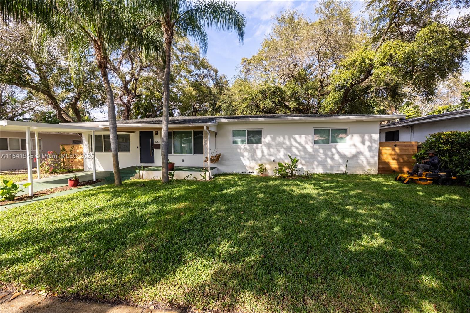 Modern and completely renovated 3 bedrooms, 2 bath home on 10k sq ft lot with new drywalls, plumbing, electrical and A/C systems. Situated in Quiet, quaint & special neighborhood. Luxurious finishes with a spacious open layout with natural light & brand-new hard wood oak flooring, high impact windows & doors, electrical blinds & beautiful light fixtures, The contemporary Kitchen features original wooden roof with large Taj Majal Quartzite Island and all new appliances. Large bedrooms equipped with custom built in closets. Step outside to a beautiful, landscaped backyard with 5 large Oak trees custom deck & new wooden fencing & Bistro lighting a perfect place to enjoy with your family and friends. Located right off Biscayne Blvd less than 4 miles away from beaches shopping areas.