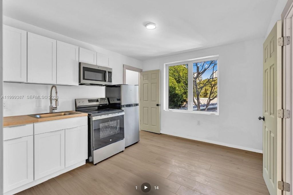 Photo of 709 SW 4th Ct #201, Fort Lauderdale, FL 33315 (MLS # A11999387)