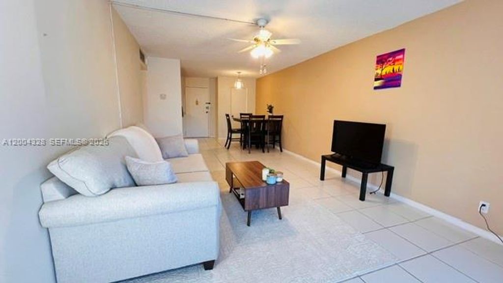 Photo of 6500 Cypress Rd #402, Plantation, FL 33317 (MLS # A12004328)