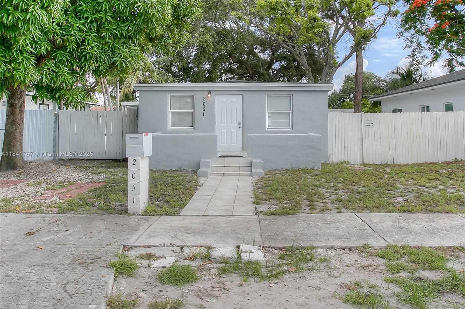 This delightful 3-bedroom, 1-bath home features beautiful laminate flooring throughout, offering a clean and cohesive look. Situated on an expansive lot, there's plenty of room to relax, entertain, expand, or even add a pool. Whether you're a first-time buyer or looking for your next investment, this property offers endless potential.