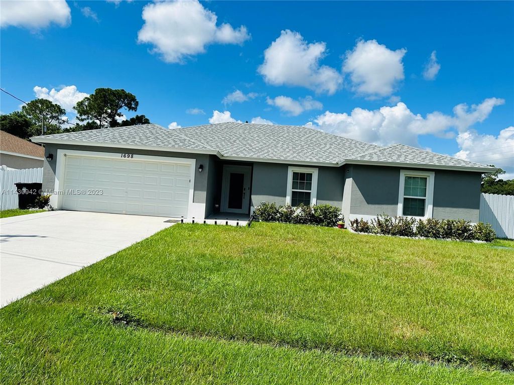 Photo of 1698 SW La Gorce Ave, Port Saint Lucie, FL 34953 (MLS # A11430942)