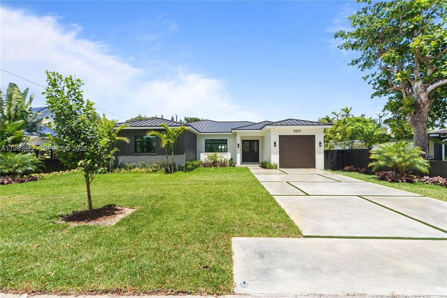 Stunning Modern Transitional new construction single-story home in the heart of South Miami. Featuring a desirable split floor plan of 2,907 sq ft of living area.  This 4BD/4.5BA residence offers open-concept living with 10-ft ceilings and oversized 63”x63” Italian porcelain floors throughout main areas. Chef’s kitchen with custom Italian cabinetry, Quartz countertops, and premium Miele appliances including gas cooktop, double ovens, wine cooler, and built-in refrigerator. Spacious pantry and abundant storage. Luxurious primary suite with spa-like bath, designer fixtures, and glass-enclosed showers. Smart home features include fiber optic wiring, monitored security system, closed-circuit security cameras, EV charger in garage, dual high-efficiency A/C systems and generator hook up ready. Private backyard with new horizontal designed wooden fence, a new 12x24 pool, marble paver deck, and lush landscaping—perfect for entertaining. Impact windows/doors, modern metal roof, functional laundry room with sink and storage, and garage. Exceptional South Miami location.