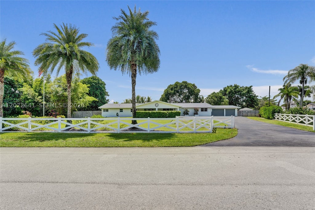 Photo of 10880 SW 25th St, Davie, FL 33324 (MLS # A12072641)