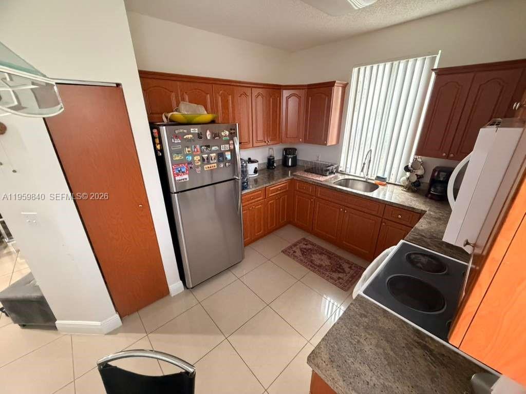 COURTYARDS AT DAVIE CONDO - Residential