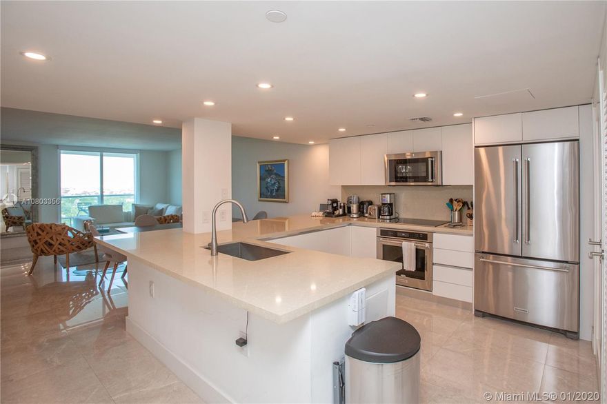 Remodeled unit. Open-kitchen with new appliances. Lots of light and marble floors. Showers in bathrooms (no tubs). Intelligent window shades and AC Central System. His/hers walk-in closet.