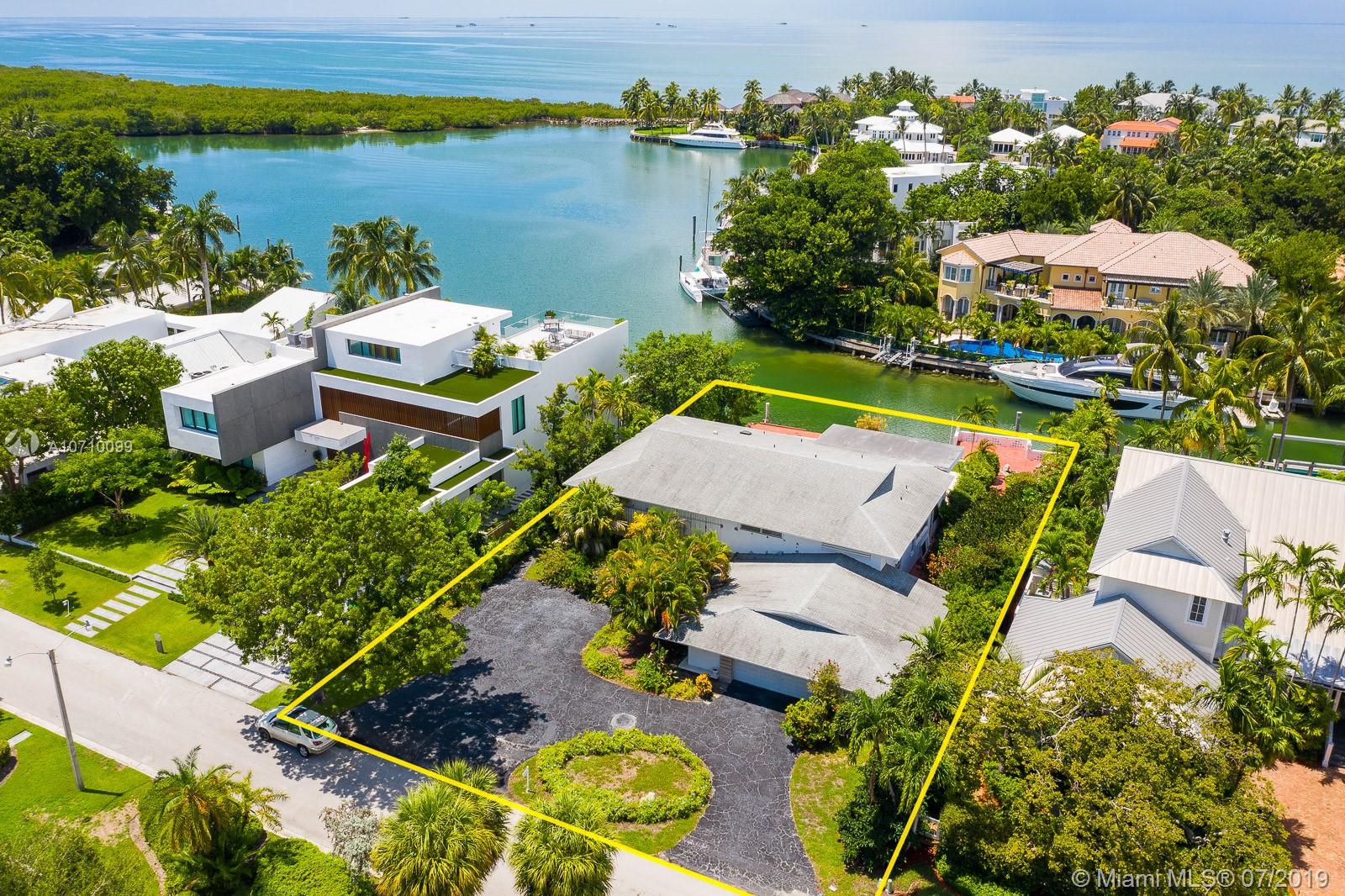 LOCATION...LOCATION... LOCATION....UNIQUE OPPORTUNITY...BUILD YOUR DREAM HOME ON AN OVERSIZED 15,500 SQFT WATERFRONT LOT IN KEY BISCAYNE. OFFERING MORE THAN 100 FT OF WATER EXPOSURE. A DREAM LOCATION FOR BOAT LOVERS. THERE IS AN EXISTING 6/5 HOME ON SITE. CALL LA FOR SHOWING INSTRUCTIONS.