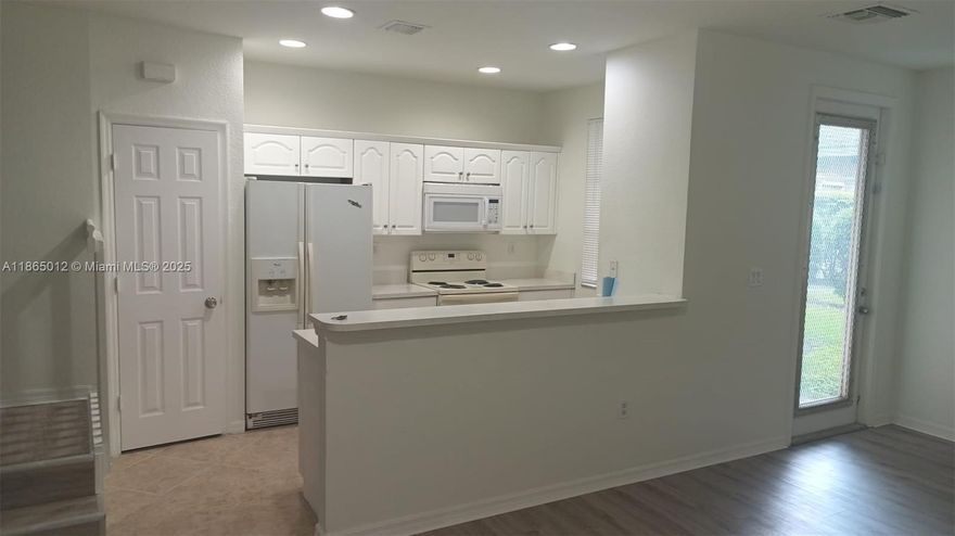 Totally fresh paint 3 bedroom 2 bath townhouse located in the sought-after community San Remo, New Second Floor Laminate cozy patio area and community pool. Close to great restaurants, shopping and
 worship. This is a must see!