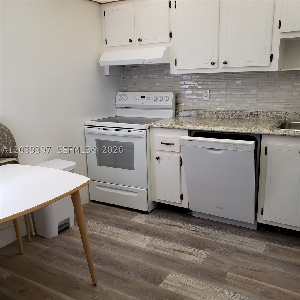 Photo of 410 SE 2nd St #418, Hallandale Beach, FL 33009 (MLS # A12039307)