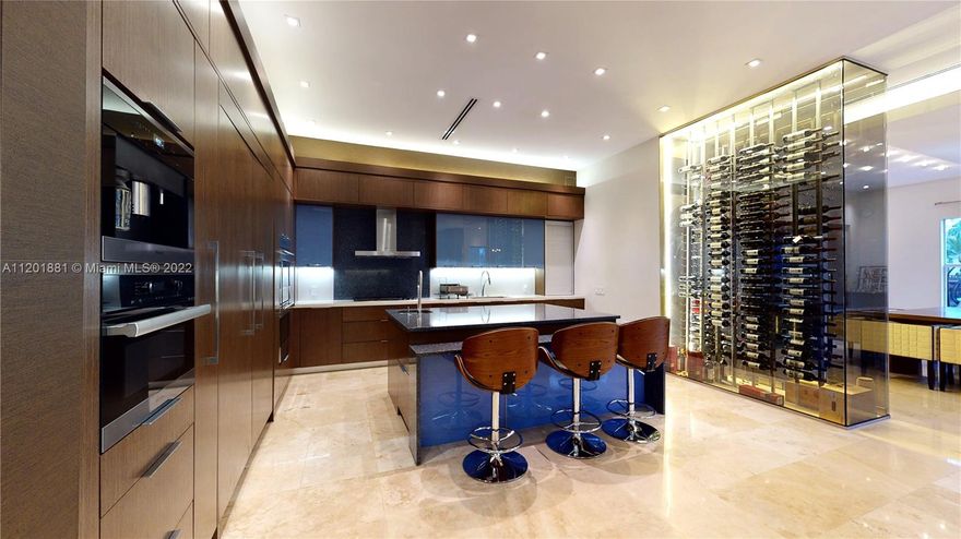 Beautiful Single Family Home is the Estates of Harbor Islands, a gated community. Home has 5 bedrooms plus nanny room, a library, a play room/ multipurpose room and theatre room and much more. Home sits on a large lot with park views facing the front of the home and water views on the rear. The Estates is most desired subdivision of Harbor Islands. Ocean Access.