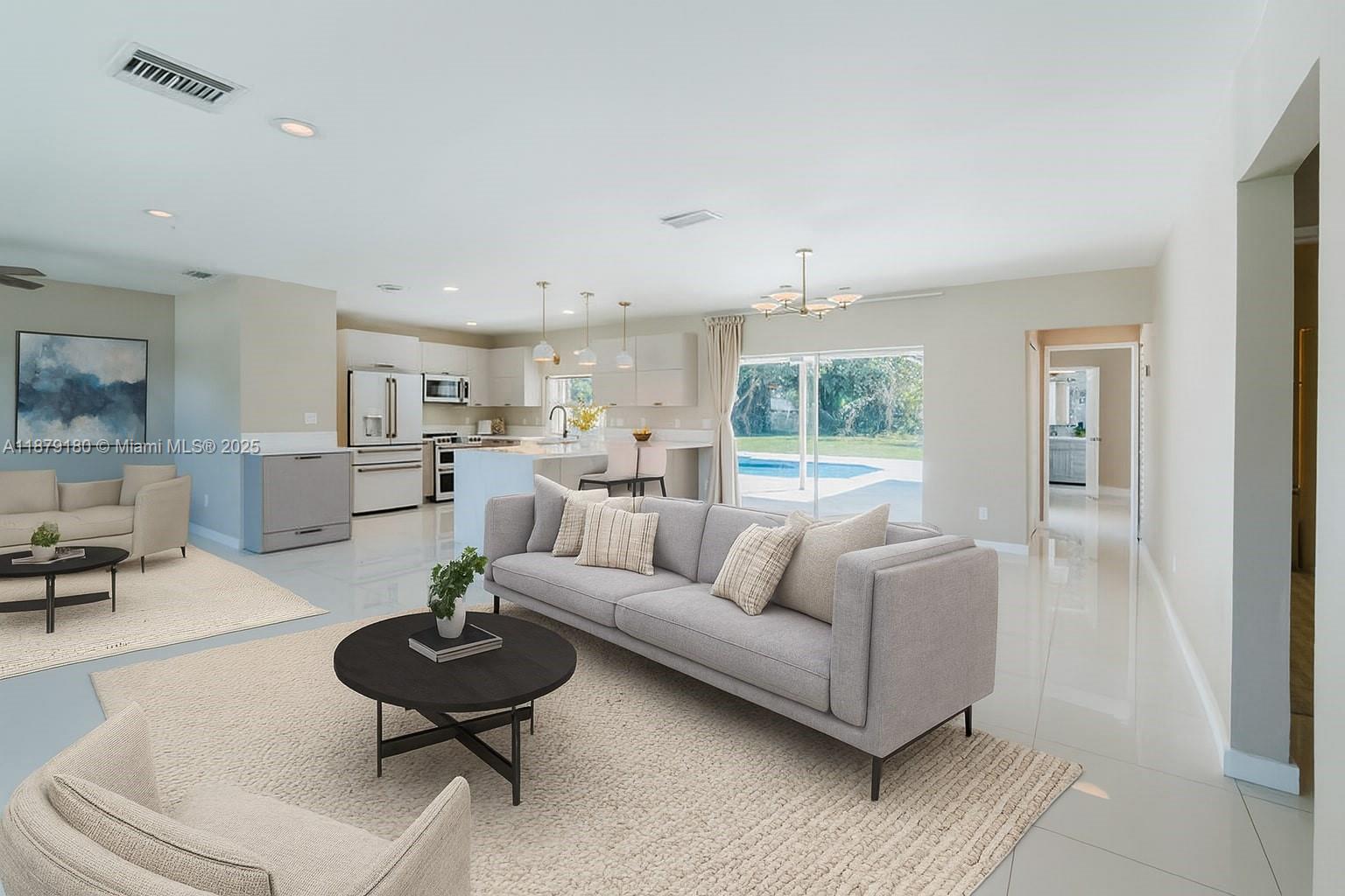 Welcome to this beautifully updated 3-bedroom, 2-bathroom home in Palmetto Bay. With 1,688 sq. ft. of living space on a generous 15,515 sq. ft. lot, this residence blends timeless charm with modern upgrades. Highlights include a custom kitchen with quartz countertops and Café appliances, a luxurious primary suite with marble shower, and sleek porcelain flooring throughout. Step outside to a private backyard oasis featuring a sparkling pool with a new Diamond Brite finish and plenty of room for entertaining. Ideally located near top-rated schools, parks, and all that Palmetto Bay has to offer, this home is the perfect combination of comfort, style, and convenience.