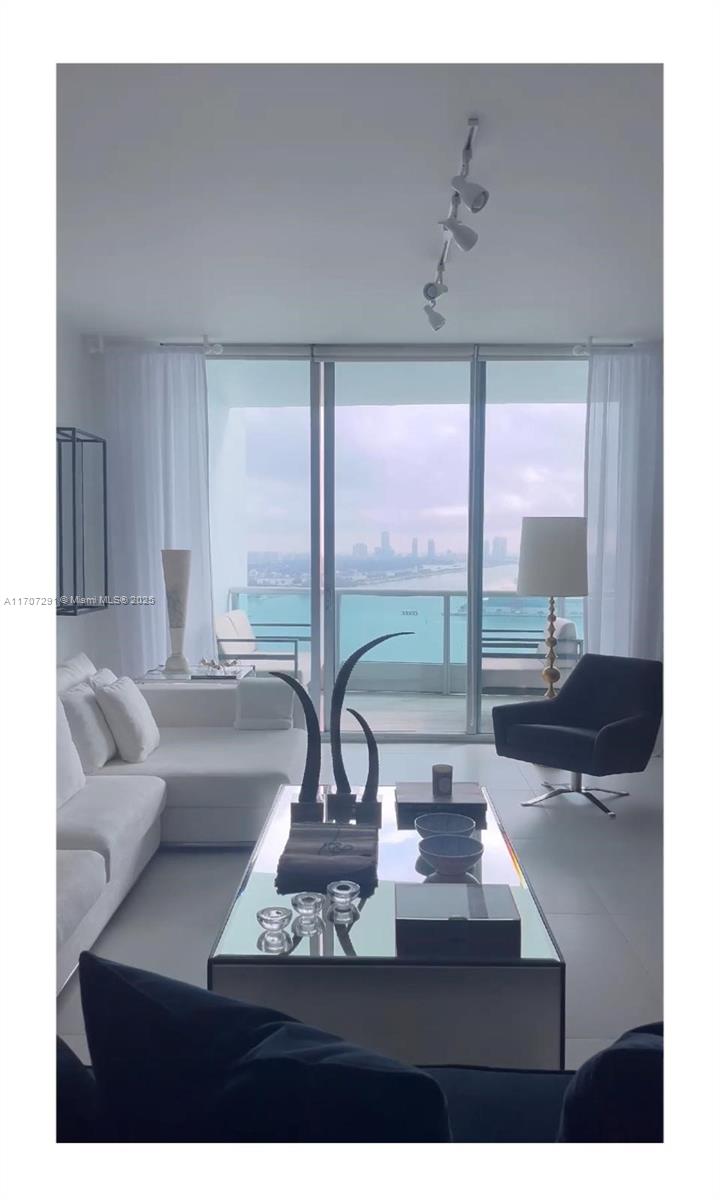 Welcome to your dream waterfront condo on the 27th floor, where luxury meets convenience in the heart of the city. This boasts a state-of-the-art gym, relaxing spa, and a theater room for entertaining guests. The pool offers a refreshing escape from the hustle and bustle of everyday life, while the open kitchen is perfect for preparing gourmet meals. Floor-to-ceiling windows flood the home with natural light and a balcony provides stunning views of the ships passing by, creating a serene atmosphere that is unmatched. The location is unbeatable, steps to the art center and opera house, and easy access to all the best restaurants, shops, luxury brands and entertainment the city has to offer. Don't miss out on this incredible opportunity to own a piece of paradise in the sky.