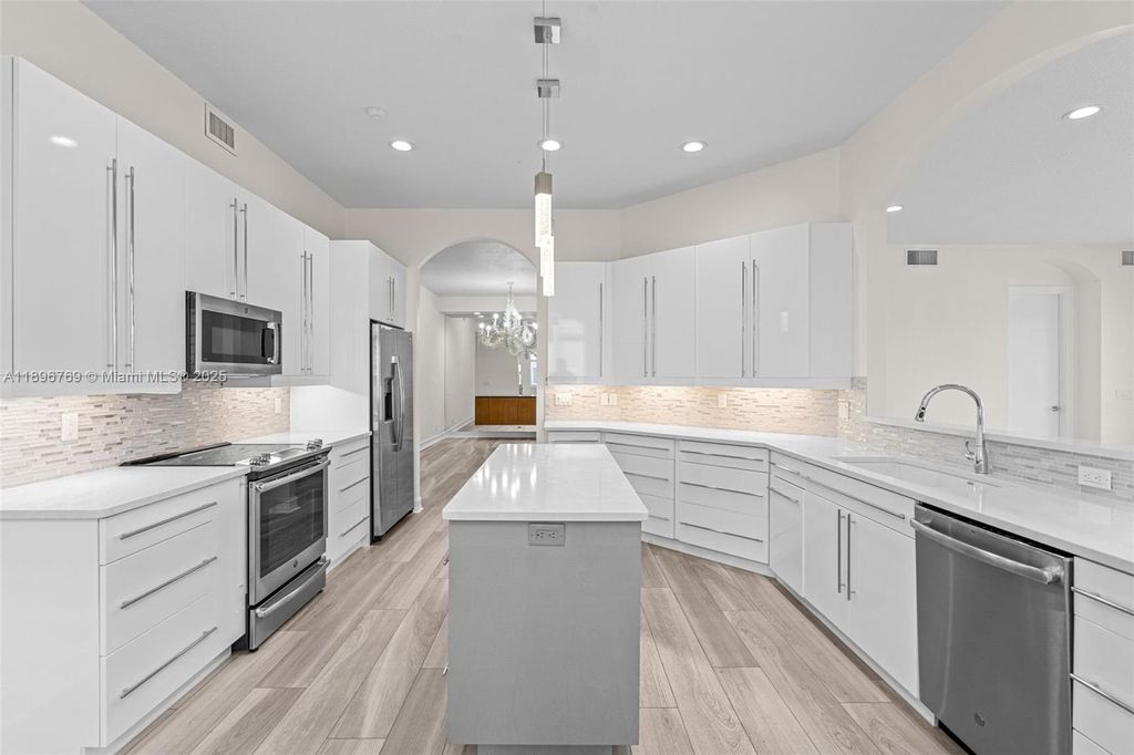 Photo of 123 Palm Bay Ter #B, Palm Beach Gardens, FL 33418 (MLS # A11896769)