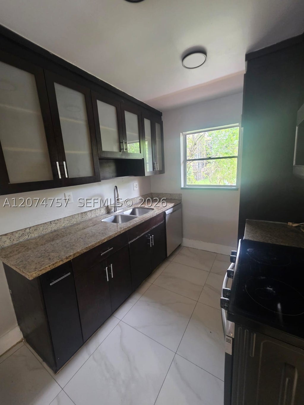 Photo of 4121 Stirling Rd #207, Dania Beach, FL 33314 (MLS # A12074757)
