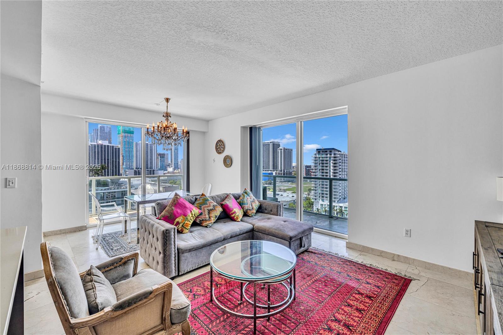 Welcome to Quantum on the Bay. Residence 1711 delivers an airy 2 bed, 2 bath 1,180 SF layout with floor-to-ceiling impact glass, a wraparound balcony, and an open kitchen finished with Euro cabinetry, stone countertops, and stainless appliances. A true split plan ensures privacy; plus a laundry room for everyday convenience. Building perks include two outdoor pools, a two-story fitness center with sauna, residents’ club rooms, theater, business center, 24-hour concierge & valet. Outside your door is Margaret Pace Park with tennis, volleyball, basketball, dog park, playground, and a scenic baywalk. Central to Downtown/Brickell, the Beach, Wynwood & the Design District—this is Miami living. Convenience and Location! Easy to show!