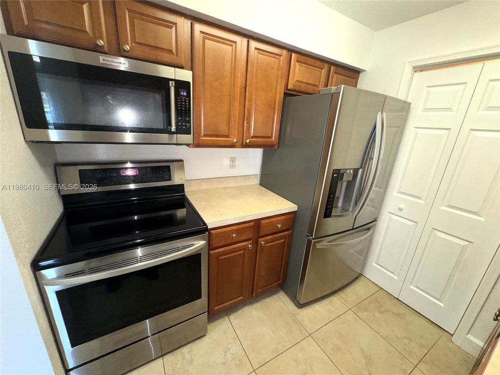 Photo of 733 Riverside Dr #1216, Coral Springs, FL 33071 (MLS # A11980410)