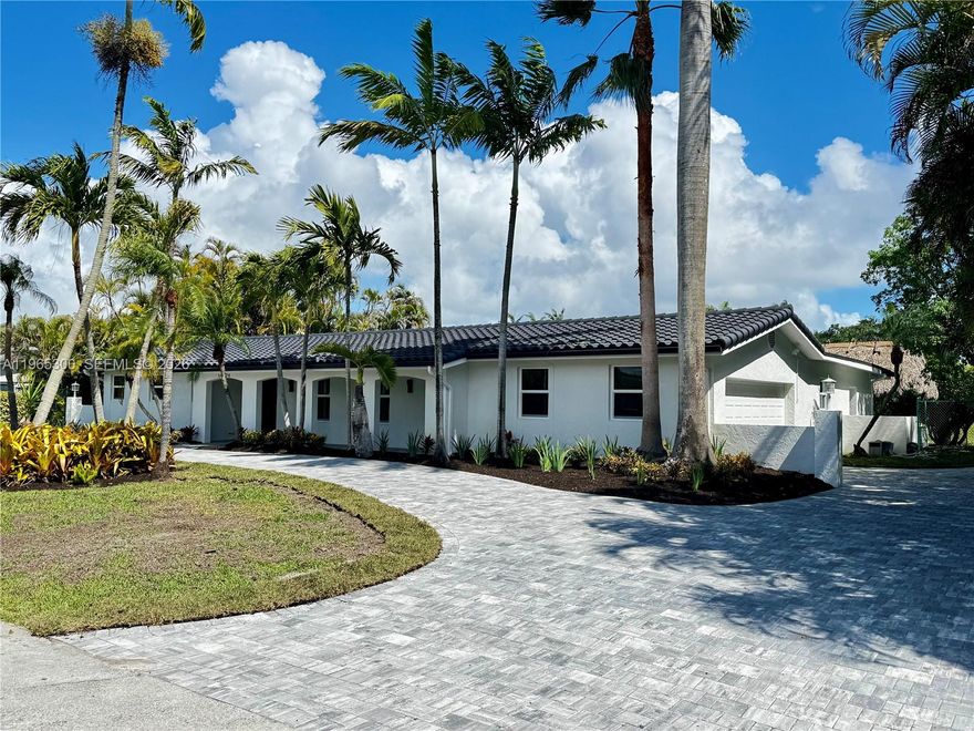 Fully remodeled and designed for modern living, this stunning Palmetto Bay home offers the perfect blend of style, comfort, and waterfront charm. Renovated from top to bottom, it features brand-new flooring throughout, impact windows and doors, and fresh interior and exterior paint.

The bright, open-concept layout seamlessly connects the living, dining, and kitchen areas, creating an ideal space for everyday living and entertaining. The brand-new kitchen showcases sleek cabinetry, contemporary finishes, and a functional design, complemented by a dedicated bar area perfect for hosting.

The spacious primary suite has been completely transformed, including a beautifully remodeled master bathroom. With 3 bedrooms and 4 full bathrooms, the home offers flexibility, privacy, and comfort for family and guests alike.

Step outside to a fully renovated pool area designed for relaxation and entertaining. The oversized lot provides generous outdoor space, while the canal in the backyard adds peaceful water views and a true South Florida feel.

This home is currently in its final stages of completion and will be ready for delivery in early April—an exceptional opportunity to own a turnkey waterfront property in one of Miami’s most desirable neighborhoods.