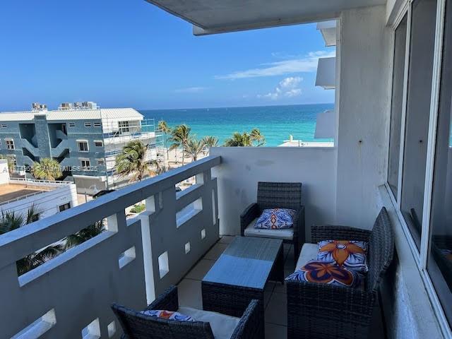 Wake up to breathtaking ocean views from this beautifully furnished condo right on Hollywood beach boardwalk. This spacious 2-bedroom residence offers a bright open living area. Steps from the sand, dining, and entertainment.