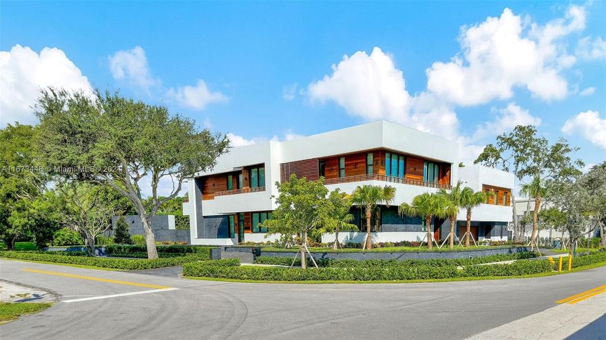 Introducing a new Spec home on an ½ acre corner lot, blending modern design and exceptional craftsmanship. Inside, large-format insulated 11' tall windows fill the first floor w/a flood of natural light, showcasing the lush greenery & pool. Italian Kitchen is Poliform w/ a large island and Miele's appliances. The Kitchen is integrated with the family room, a formal Dining, large reception with home theater seating. On the 2nd floor, a Primary suite is a retreat w/zero-gravity bathtub, Large WIC, & 1300 sq.ft of wraparound balconies, w/4 more suites with their own WIC & Full Bathroom. Total under AC 8,500 s.f.  The backyard is a paradise, w/outdoor full Kitchen under AC and a cabana bath. 4-car garage Under AC w /gym, guest or Maid room w/ full bath at the top.