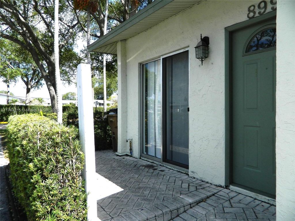 Photo of 899 Crystal Lake Dr #899, Deerfield Beach, FL 33064 (MLS # A11794215)