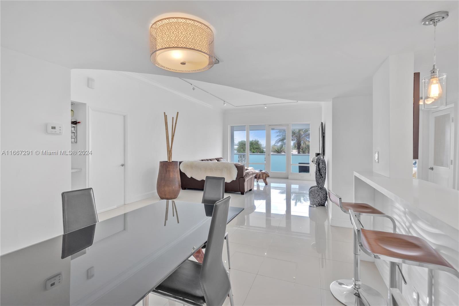 Own your piece of paradise next to the ocean! This furnished luxurious and tastefully remodeled condo in Point of Americas offers 2 beds and 2 baths. Wall-to-wall windows and a balcony that covers the length of the unit make this the perfect haven to enjoy the ocean breeze. The remodeled kitchen features top-of-the-line appliances. Five-star luxury resort amenities include 10-acre oceanfront with cabana and beach attendants, grand lobby, restaurant, fitness centers, guest rooms, EV charging stations, massage rooms, immerse yourself in the epitome of leisure and relaxation with two luxurious pools. Accordion shutters throughout. Building has passed 50 year re-certification and has reserves. Situated close to major highways, malls, dining, and places of worship. Motivated seller.