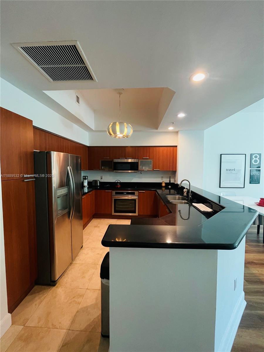 THE OAKS I CONDO - Residential Lease