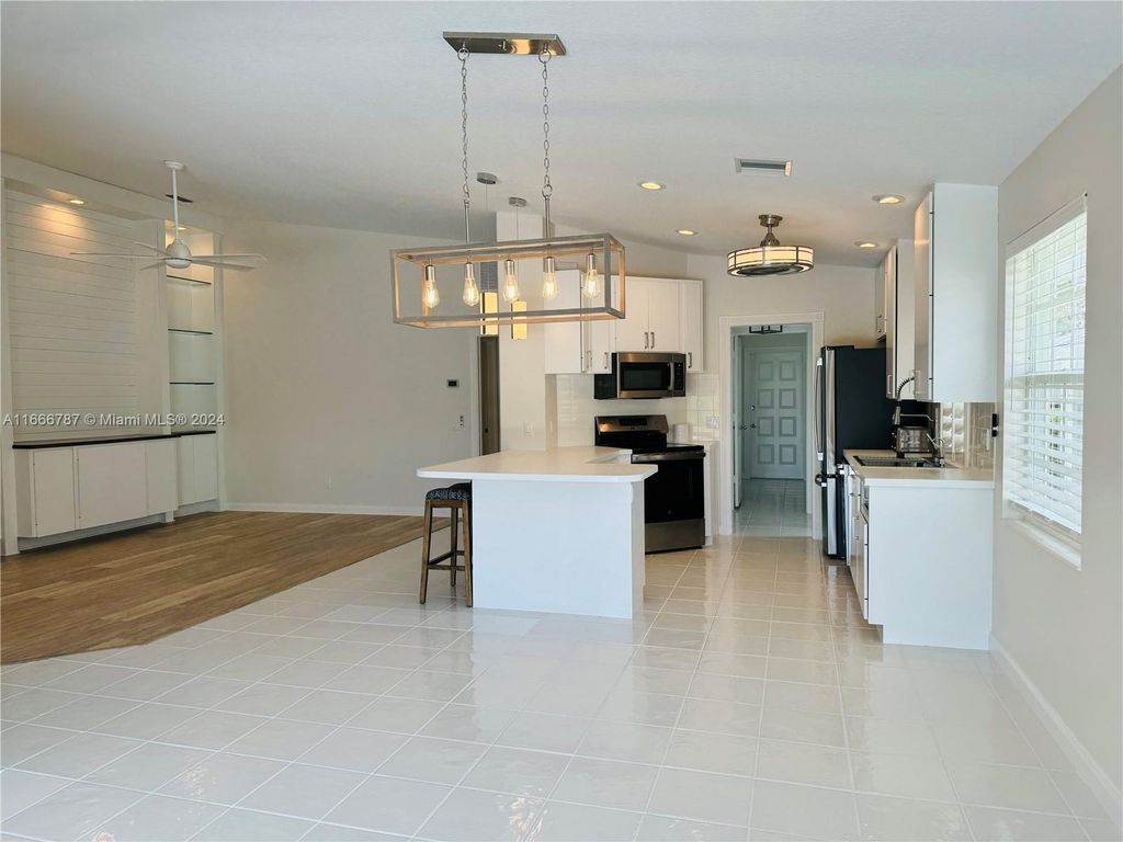 Photo of 1648 SW Waterfall Blvd, Palm City, FL 34990 (MLS # A11666787)