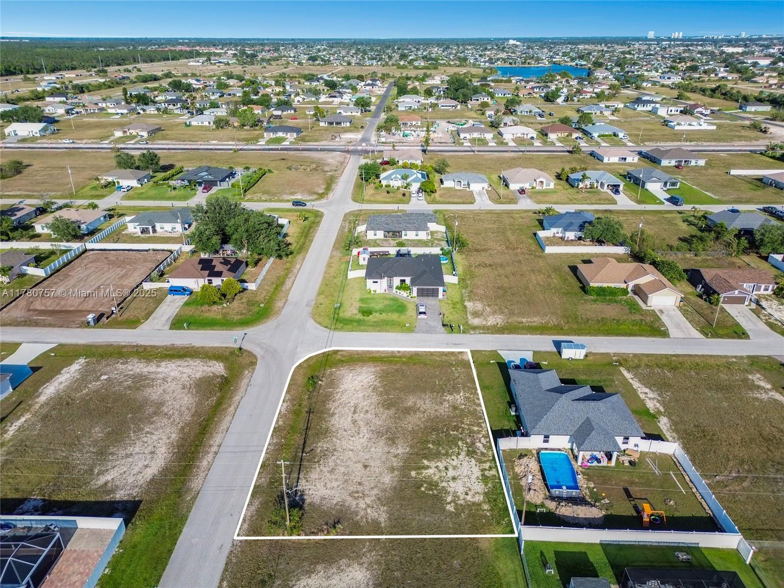 Build your dream home on this spacious 0.25-acre corner lot. Situated in a rapidly growing neighborhood, this property offers easy access to major roads, making commuting convenient. Enjoy proximity to top-rated schools such as Diplomat Elementary and Diplomat Middle School, as well as shopping centers, dining options, and recreational parks. With its desirable location and ample space, this lot presents an excellent opportunity to invest in one of Cape Coral's most sought-after areas. Lots can be sold individually or as a package of four. If all four lots are purchased together, the price is negotiable. Great opportunity for buyers looking to invest in multiple parcels!