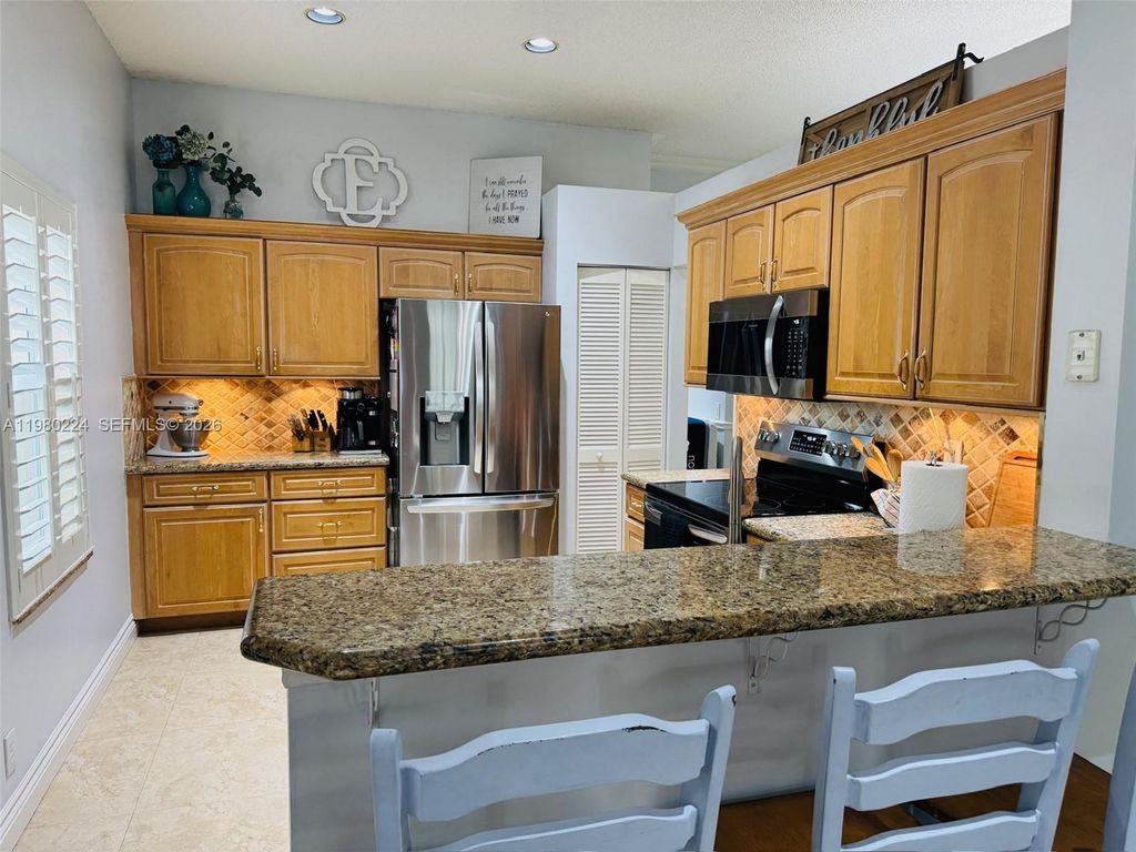 Photo of 4321 Willow Ridge Dr, Weston, FL 33331 (MLS # A11980224)