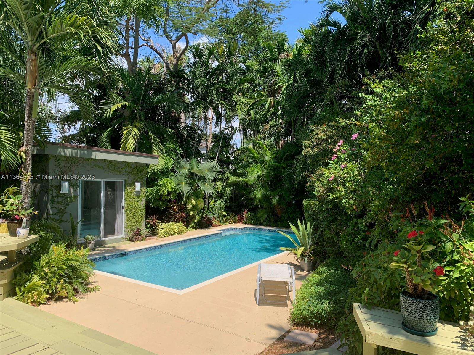 FURNISHED RENTAL JULY 1-SEPT 30. SUNNY 3 BED RM- 1 FULL BATH & 2-1/2 BATH HOME W/ 1 BED ROOM COTTAGE. QUIET SOUTH GROVE ROAD W/ PRIVATE POLICE PATROL. WALK TO PARKS, GROVE WATERFRONT & RESTAURANTS. MAIN HOUSE OFFERS FOYER ENTRY, FORMAL LIVING W/ FLOOR TO CEILING WINDOWS OVERLOOKING TROPICAL GARDENS, SEPARATE DINING AREA, GOURMET KITCHEN W/ SS APPLIANCES & EAT IN COUNTER, PRIVATE DEN W/ PULL OUT COUCH & SHELVED CLOSET, LAUNDRY RM, WASHER & DRYER, ENCHANTING AND SECLUDED OUTDOOR SHOWER W/ CHANGING ROOM OFF PRIMARY BEDROOM, ENSUITE BATHROOM COMPLIMENTS 2ND BEDROOM IN THIS IMPECCABLY MAINTAINED SUMMER RETREAT. COTTAGE HAS QUEEN BED AND IS AIR CONDITIONED. IMPACT GLASS WINDOWS AND/OR SHUTTERS THROUGHOUT. OUTDOOR DECK, ALARM SYS. DRIVEWAY AND SREET PARKING. COTTAGE MAY NOT BE SUBLET.