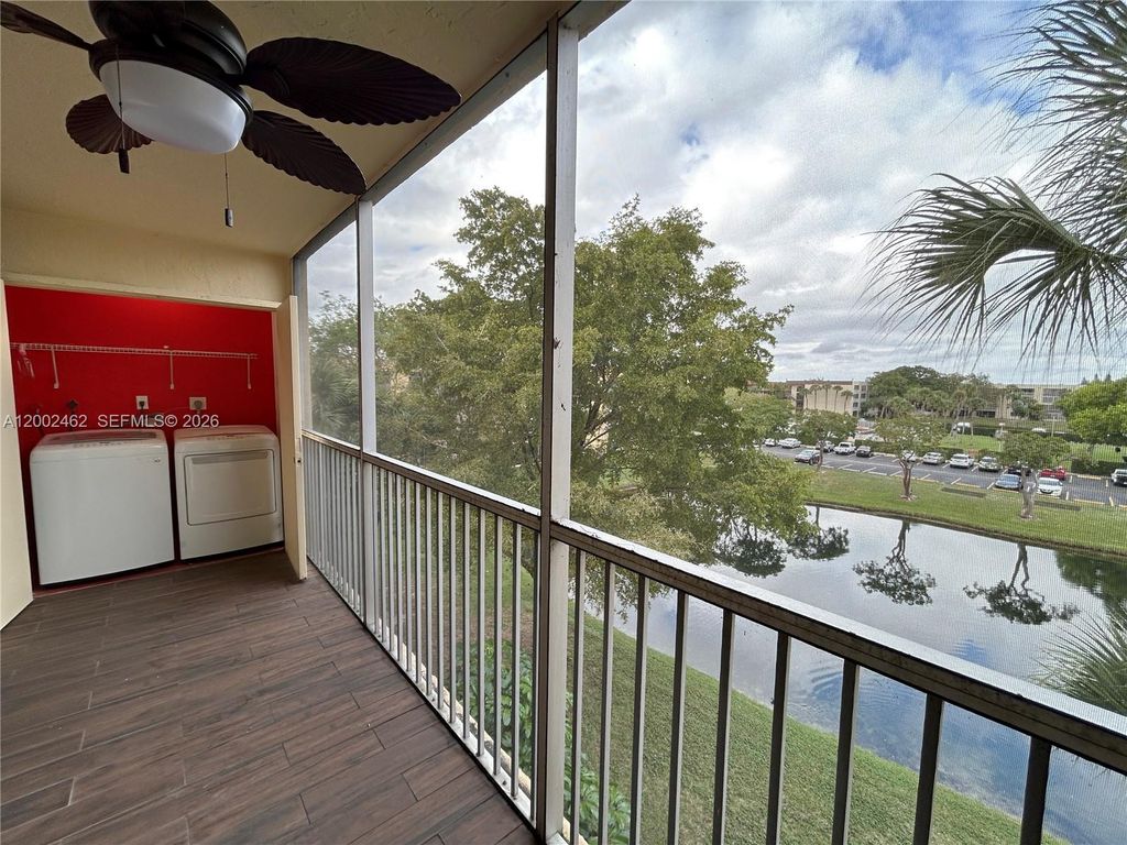 Photo of 3121 NW 47th Ter #416, Lauderdale Lakes, FL 33319 (MLS # A12002462)